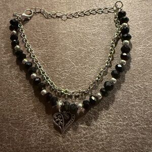 Elegant Black and Silver Heart Charm Bracelet